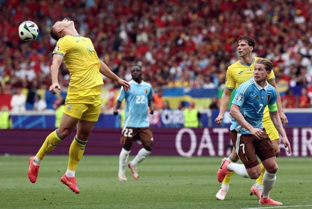 Ukraine s Oleksandr Svatok and Belgium s Kevin De Bruyne pictured in action during a soccer game between Ukraine and Belgian national soccer team Red Devils, Wednesday 26 June 2024 in Stuttgart, Germany, the third match in the group stage of the UEFA EURO, EM, Europameisterschaft,Fussball 2024 European championships. BRUNOxFAHY  x95324441x