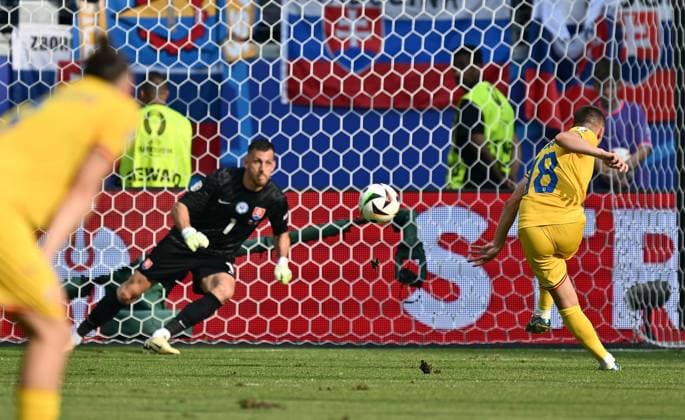 26 06 2024, xscotx, Football EM 2024, Slovakia Romania, emspor, v l Martin Dubravka Slovakia , Razvan Gabriel Marin Romania Romania Goal scored, scores the goal for 1 1 Frankfurt am Main