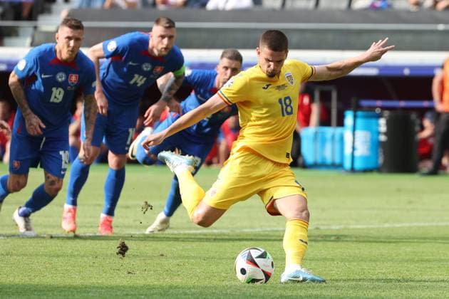 Goal to 1 1 from penalty kick by Razvan Marin Romania, No. 18 , Preliminary round match M33, SVK ROU, Group E, European Football Championship, Slovakia vs Romania, European Football Championship, Slovakia vs Romania, Frankfurt, 26 06 2024,