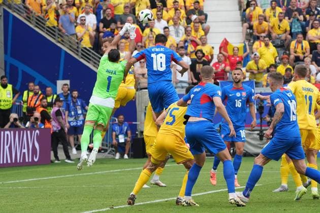 Goalkeeper Goalie Florin Nita Romania Romania, 01 clears against David Strelec Slovakia, Slovakia, 18 Frankfurt 26 06 2024 Slovakia vs Romania, EURO2024 M33 Group E, EM Arena Frankfurt
