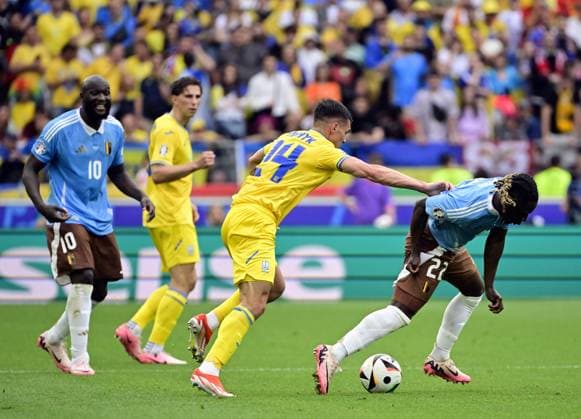 Ukraine s Heorhiy Sudakov and Belgium s Jeremy Doku pictured in action during a soccer game between Ukraine and Belgian national soccer team Red Devils, Wednesday 26 June 2024 in Stuttgart, Germany, the third match in the group stage of the UEFA EURO, EM, Europameisterschaft,Fussball 2024 European championships. DIRKxWAEM  x95326443x