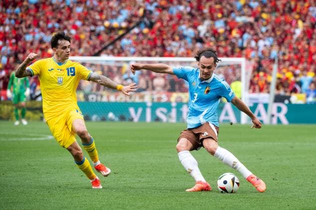 Arthur Theate Belgium, 03 in duel with Mykola Shaparenko Ukraine, 19 , GER, Ukraine UKR vs Belgium BEL , European Football Championship, UEFA EURO 2024, Group E, Matchday 3, 26 06 2024 GER, Ukraine UKR vs Belgium BEL , European Football Championship, UEFA EURO 2024, Group E, Matchday 3, 26 06 2024 Stuttgart Copyright: xEibner-Pressefoto Memmlerx EP_MMR