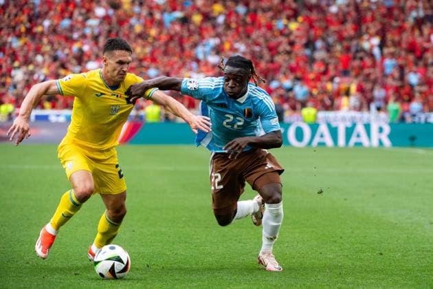 Jeremy Doku Belgium, 22 in duel with Oleksandr Tymchyk Ukraine, 24 , GER, Ukraine UKR vs Belgium BEL , European Football Championship, UEFA EURO 2024, Group E, Matchday 3, 26 06 2024 GER, Ukraine UKR vs Belgium BEL , European Football Championship, UEFA EURO 2024, Group E, Matchday 3, 26 06 2024 Stuttgart Copyright: xEibner-Pressefoto Memmlerx EP_MMR