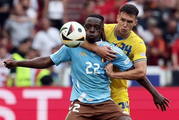 Sport Bilder des Tages Belgium s Jeremy Doku and Ukraine s Oleksandr Tymchyk fight for the ball during a soccer game between Ukraine and Belgian national soccer team Red Devils, Wednesday 26 June 2024 in Stuttgart, Germany, the third match in the group stage of the UEFA EURO, EM, Europameisterschaft,Fussball 2024 European championships. BRUNOxFAHY  x95328576x