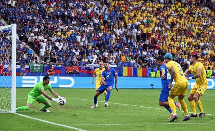26 06 2024, xsltx, European Football Championship 2024, Slovakia Romania emspor, v l Constantin Florin Nita Romania Romania , David Strelec Slovakia DFL DFB REGULATIONS PROHIBIT ANY USE OF PHOTOGRAPHS as IMAGE SEQUENCES and or QUASI VIDEO Frankfurt