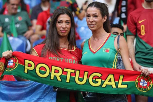 Portugal fans hold scarfs Georgia v Portugal, UEFA European Championship, EM, Europameisterschaft 2024, Group F, Football, Arena AufSchalke, Gelsenkirchen, Germany - 26 Jun 2024 EDITORIAL USE ONLY No use with unauthorised audio, video, data, fixture lists, club league logos or live services. Online in-match use limited to 120 images, no video emulation. No use in betting, games or single club league player publications.  Copyright: xPaulxCurrie Shutterstockx 14555619g