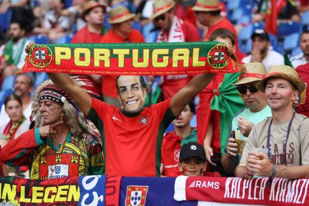 Portugal fans hold scarfs Georgia v Portugal, UEFA European Championship, EM, Europameisterschaft 2024, Group F, Football, Arena AufSchalke, Gelsenkirchen, Germany - 26 Jun 2024 EDITORIAL USE ONLY No use with unauthorised audio, video, data, fixture lists, club league logos or live services. Online in-match use limited to 120 images, no video emulation. No use in betting, games or single club league player publications.  Copyright: xPaulxCurrie Shutterstockx 14555619b