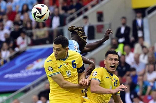 Ukraine s Taras Stepanenko, Belgium s Jeremy Doku and Ukraine s Oleksandr Tymchyk fight for the ball during a soccer game between Ukraine and Belgian national soccer team Red Devils, Wednesday 26 June 2024 in Stuttgart, Germany, the third match in the group stage of the UEFA EURO, EM, Europameisterschaft,Fussball 2024 European championships. DIRKxWAEM  x95329552x
