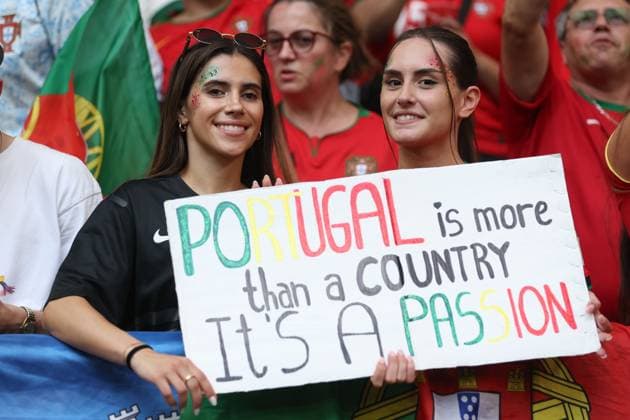 Portugal fans hold a sign in the stands Georgia v Portugal, UEFA European Championship, EM, Europameisterschaft 2024, Group F, Football, Arena AufSchalke, Gelsenkirchen, Germany - 26 Jun 2024 EDITORIAL USE ONLY No use with unauthorised audio, video, data, fixture lists, club league logos or live services. Online in-match use limited to 120 images, no video emulation. No use in betting, games or single club league player publications.  Copyright: xPaulxCurrie Shutterstockx 14555619m