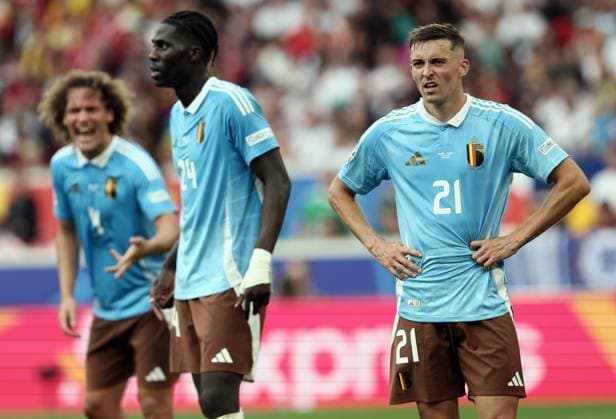 Belgium s Wout Faes, Belgium s Amadou Onana and Belgium s Timothy Castagne react during a soccer game between Ukraine and Belgian national soccer team Red Devils, Wednesday 26 June 2024 in Stuttgart, Germany, the third match in the group stage of the UEFA EURO, EM, Europameisterschaft,Fussball 2024 European championships. BRUNOxFAHY  x95329647x