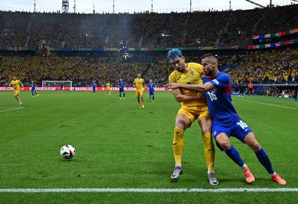 26 06 2024, xsltx, European Football Championship 2024, Slovakia Romania emspor, v l Andrei Florin Ratiu Romania Romania , David Hancko Slovakia DFL DFB REGULATIONS PROHIBIT ANY USE OF PHOTOGRAPHS as IMAGE SEQUENCES and or QUASI VIDEO Frankfurt