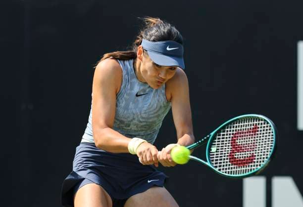 26th June 2024; Devonshire Park, Eastbourne, East Sussex, England: Rothesay International Eastbourne, Day 3, Emma Raducanu (GBR) plays a backhand against Jessica Pegula (USA) in her womens singles match  ActionPlus12660825 HongboxChen