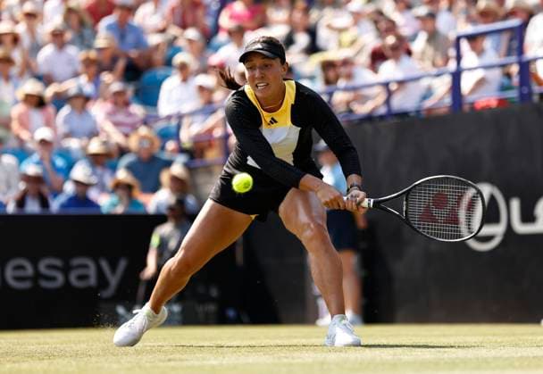 26th June 2024; Devonshire Park, Eastbourne, East Sussex, England: Rothesay International Eastbourne, Day 3, Jessica Pegula (USA) plays a backhand against Emma Raducanu (GBR) in her womens singles match  ActionPlus12660839 HongboxChen
