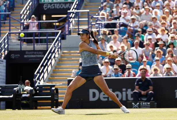 26th June 2024; Devonshire Park, Eastbourne, East Sussex, England: Rothesay International Eastbourne, Day 3, Emma Raducanu (GBR) plays a backhand against Jessica Pegula (USA) in her womens singles match  ActionPlus12660844 HongboxChen