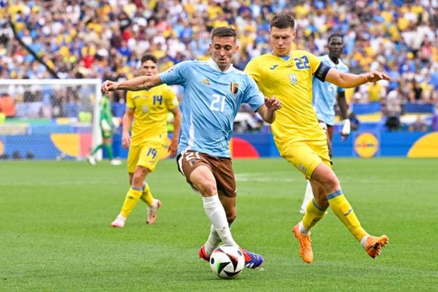 Ukraine v Belgium Group E - UEFA EURO, EM, Europameisterschaft,Fussball 2024 STUTTGART, GERMANY - JUNE 26 : Castagne Timothy defender of Belgium and Mykola Matviyenko defender of Ukraine during the UEFA EURO 2024 European Football Championship tournament group E stage match between Ukraine and Belgium at Stuttgart Arena on June 26, 2024 in Stuttgart, Germany, 26 06 2024  Copyright: xDhax