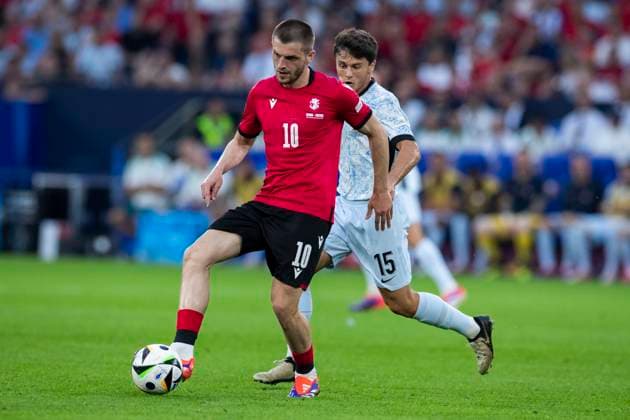 UEFA EURO 2024 Georgia Portugal 26 06 2024 Giorgi Chakvetadze Georgia, 10 , Joao Neves Portugal, 15 UEFA EURO 2024 Georgia Portugal Arena AufSchalke, Gelsenkirchen, on 26 06 2024 Copyright: xBEAUTIFULxSPORTS Meuselx