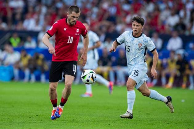 UEFA EURO 2024 Georgia Portugal 26 06 2024 Giorgi Chakvetadze Georgia, 10 , Joao Neves Portugal, 15 UEFA EURO 2024 Georgia Portugal Arena AufSchalke, Gelsenkirchen, on 26 06 2024 Copyright: xBEAUTIFULxSPORTS Meuselx