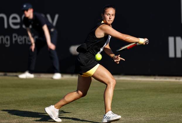 26th June 2024; Devonshire Park, Eastbourne, East Sussex, England: Rothesay International Eastbourne, Day 3, Daria Kasatkina plays a backhand against Yue Yua (CHN)  ActionPlus12660914 HongboxChen
