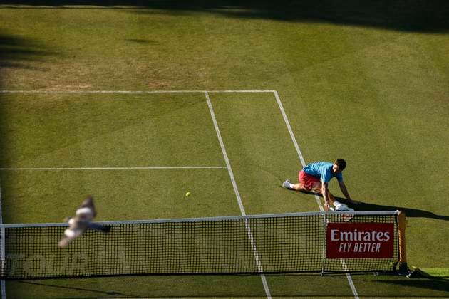 26th June 2024; Devonshire Park, Eastbourne, East Sussex, England: Rothesay International Eastbourne, Day 3; Thiago Seyboth Wild (BRA) plays a backhand against Taylor Fritz (USA)  ActionPlus12660924 HongboxChen