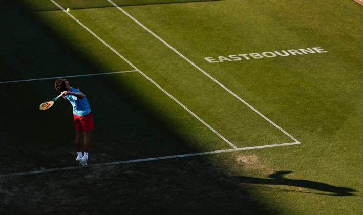 26th June 2024; Devonshire Park, Eastbourne, East Sussex, England: Rothesay International Eastbourne, Day 3; Thiago Seyboth Wild (BRA) serves to Taylor Fritz (USA)  ActionPlus12660926 HongboxChen
