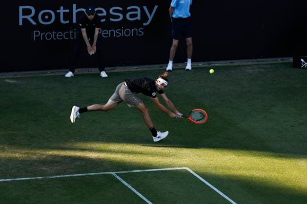 26th June 2024; Devonshire Park, Eastbourne, East Sussex, England: Rothesay International Eastbourne, Day 3; Taylor Fritz (USA) plays a backhand against Thiago Seyboth Wild (BRA)  ActionPlus12660931 HongboxChen