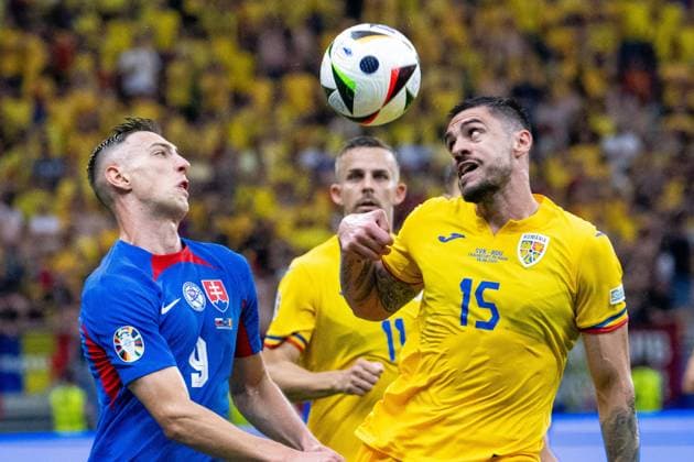 GER, EURO 2024, Group E, Slovakia SVK vs Romania ROU 24 06 2024, Frankfurt Arena, Frankfurt, GER, EURO 2024, Group E, Slovakia SVK vs Romania ROU In the picture George Puscas Romania ROU, 09 header header duel dynamics, action, action, game scene Andrei Barcu Romania ROU, 15 in duel, duel, dynamics, action, action, game scene nordphotoxGmbHxx xDenkinger nph00015