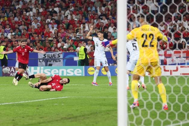 Luka Lochoshvili of Georgia goes down from the challenge of Antonio Silva of Portugal and a penalty is given after consulting VAR Georgia v Portugal, UEFA European Championship, EM, Europameisterschaft 2024, Group F, Football, Arena AufSchalke, Gelsenkirchen, Germany - 26 Jun 2024 EDITORIAL USE ONLY No use with unauthorised audio, video, data, fixture lists, club league logos or live services. Online in-match use limited to 120 images, no video emulation. No use in betting, games or single club league player publications. Copyright: xPaulxCurrie Shutterstockx 14555619ef