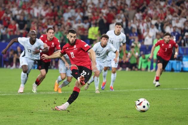 Georges Mikautadze of Georgia scores the sides second goal from the penalty spot to make it 2-0 to Georgia Georgia v Portugal, UEFA European Championship, EM, Europameisterschaft 2024, Group F, Football, Arena AufSchalke, Gelsenkirchen, Germany - 26 Jun 2024 EDITORIAL USE ONLY No use with unauthorised audio, video, data, fixture lists, club league logos or live services. Online in-match use limited to 120 images, no video emulation. No use in betting, games or single club league player publications. Copyright: xPaulxCurrie Shutterstockx 14555619eh