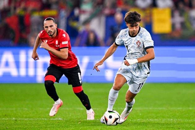 2024-06-26 Georgia v Portugal - Group F - UEFA EURO, EM, Europameisterschaft,Fussball 2024 GELSENKIRCHEN, GERMANY - JUNE 26: Giorgi Kochorashvili of Georgia battles for possession with Joao Felix of Portugal during the Group F - UEFA EURO 2024 match between Georgia and Portugal at Arena AufSchalke on June 26, 2024 in Gelsenkirchen, Germany. (Photo by Pablo Morano BSR Agency) Gelsenkirchen Germany Content not available for redistribution in The Netherlands directly or indirectly through any third parties. Copyright: xBSRxAgencyx