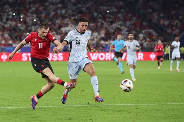 Giorgi Chakvetadze of Georgia takes a shot but fails to score Georgia v Portugal, UEFA European Championship, EM, Europameisterschaft 2024, Group F, Football, Arena AufSchalke, Gelsenkirchen, Germany - 26 Jun 2024 EDITORIAL USE ONLY No use with unauthorised audio, video, data, fixture lists, club league logos or live services. Online in-match use limited to 120 images, no video emulation. No use in betting, games or single club league player publications. Copyright: xPaulxCurrie Shutterstockx 14555619fl
