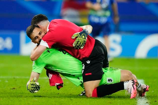 Georgia v Portugal: Group F - UEFA EURO, EM, Europameisterschaft,Fussball 2024 Giorgi Mamardashvili goalkeeper of Georgia and Valencia CF and Giorgi Gocholeishvili right-back of Georgia and Shakhtar Donetsk celebrate victory after the UEFA EURO 2024 group stage match between Georgia and Portugal at Arena AufSchalke on June 26, 2024 in Gelsenkirchen, Germany. Gelsenkirchen Germany  Copyright: xJosexBretonx originalFilename:bretonhernandez-georgiav240626_np8JC.jpg