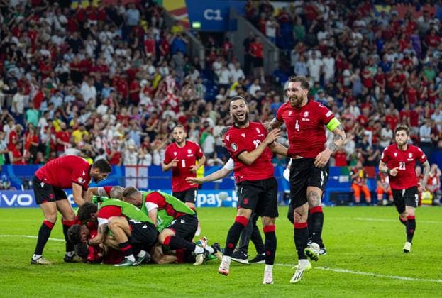 Football - UEFA EURO, EM, Europameisterschaft,Fussball 2024 - Group F - Georgia v Portugal GELSENKIRCHEN, GERMANY - Wednesday, June 26, 2024: Georgia s captain Guram Kashia (R) leads the celebrations with second goal-scorer Georges Mikautadze after the UEFA Euro 2024 Group F match between Georgia and Portugal at the Arena AufSchalke. Georgia won 2-0. (Photo by David Rawcliffe Propaganda) GELSENKIRCHEN Arena AufSchalke NORTH RHINE-WESTPHALIA GERMANY  Copyright: xDavidxRawcliffex P2024-06-26-Georgia_Portugal-137