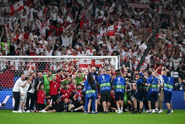 Football, European Championship, EURO 2024, Group F, Veltins Arena Gelsenkirchen Georgia Portugal 2 0 Georgian team celebrates after the match, joy, action