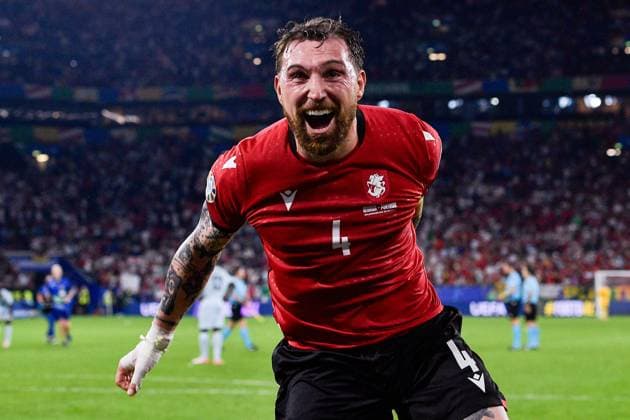 2024-06-26 Georgia v Portugal - Group F - UEFA EURO, EM, Europameisterschaft,Fussball 2024 GELSENKIRCHEN, GERMANY - JUNE 26: Guram Kashia of Georgia celebrates his sides win during the Group F - UEFA EURO 2024 match between Georgia and Portugal at Arena AufSchalke on June 26, 2024 in Gelsenkirchen, Germany. (Photo by Pablo Morano BSR Agency) Gelsenkirchen Germany Content not available for redistribution in The Netherlands directly or indirectly through any third parties. Copyright: xBSRxAgencyx