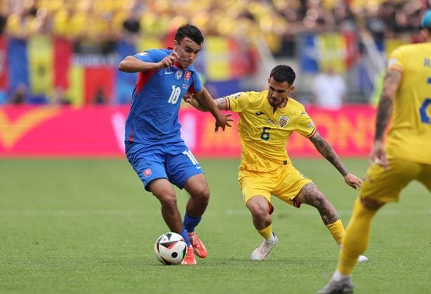 26 06 2024, European Football Championship, UEFA EURO 2024, Slovakia Romania, Group E, Arena Frankfurt, f l , David Strelec Slovakia , Marius Mihai Marin Romania Copyright: HMBxMedia