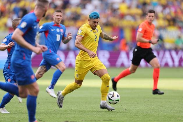 26 06 2024, European Football Championship, UEFA EURO 2024, Slovakia Romania, Group E, Arena Frankfurt, v l , Andrei Florin Ratiu Romania Copyright: HMBxMedia