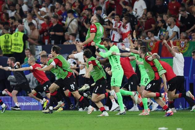 Georgia v Portugal UEFA EURO, EM, Europameisterschaft,Fussball 2024 Group F The Georgia bench rush onto the pitch to celebrate victory at the end of the UEFA Euro 2024 Group F match between Georgia and Portugal at Veltins-Arena, Gelsenkirchen Copyright: xPaulxChestertonx FIL-20286-0138 UK Newspapers OUT