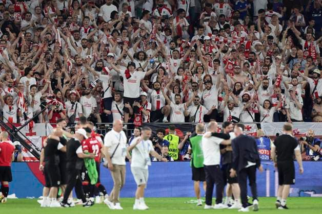 Georgia v Portugal UEFA EURO, EM, Europameisterschaft,Fussball 2024 Group F The Georgia players and the Georgia fans celebrate victory at the end of the UEFA Euro 2024 Group F match between Georgia and Portugal at Veltins-Arena, Gelsenkirchen Copyright: xPaulxChestertonx FIL-20286-0179 UK Newspapers OUT