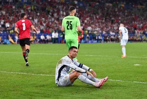 Cristiano Ronaldo Portugal on the ground 26 06 2024, European Football Championship 2024, Preliminary round, Matchday 3 Georgia Portugal 2 0 Gelsenkirchen Veltins Arena Nordrhein Westfalen Germany Team2