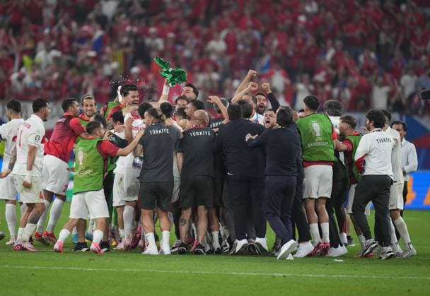 Turkiye s players celebrate their victory after UEFA EURO, EM, Europameisterschaft,Fussball 2024 Group F football match between Turkiye and Czechia at Volksparkstadion in Hamburg, Germany, on 26 June, 2024. (Mehmet Sirin Toplaoglu - Depo Photos) 18364701