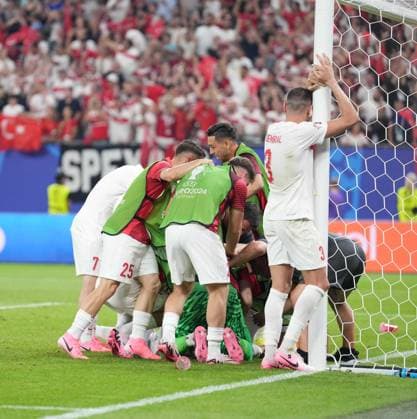 Turkiye s player Cenk Tosun celebrates his goal with teammates during UEFA EURO, EM, Europameisterschaft,Fussball 2024 Group F football match between Turkiye and Czechia at Volksparkstadion in Hamburg, Germany, on 26 June, 2024. (Mehmet Sirin Toplaoglu - Depo Photos) 18364718