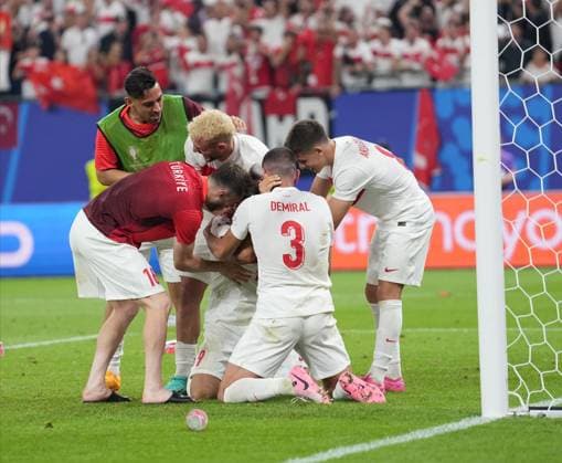Turkiye s player Cenk Tosun celebrates his goal with teammates during UEFA EURO, EM, Europameisterschaft,Fussball 2024 Group F football match between Turkiye and Czechia at Volksparkstadion in Hamburg, Germany, on 26 June, 2024. (Mehmet Sirin Toplaoglu - Depo Photos) 18364720