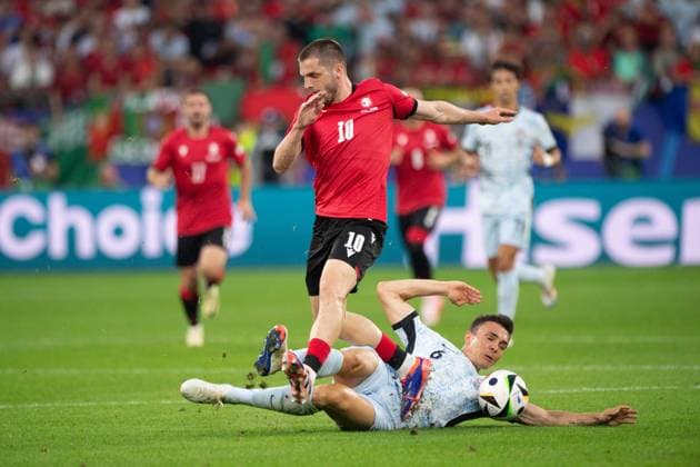 Giorgi Chakvetadze GEO vs Joao Palhinha POR , Action, Duel, Group Stage Group F Georgia GEO Portugal POR 2 0 on 26 06 2024 Stadion Auf Schalke in Gelsenkirchen, Football UEFA EURO 2024 GERMANY from 14 06 2024 14 07 2024 Â