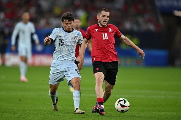 Giorgi Chakvetadze (Georgia)Joao Neves (Portugal) during the UEFA EURO, EM, Europameisterschaft,Fussball Germany 2024 match between Georgia 2-0 Portugal at Arena AufSchalke on June 26, 2024 in Gelsenkirchen, Germany. Noxthirdxpartyxsales  (257799634)