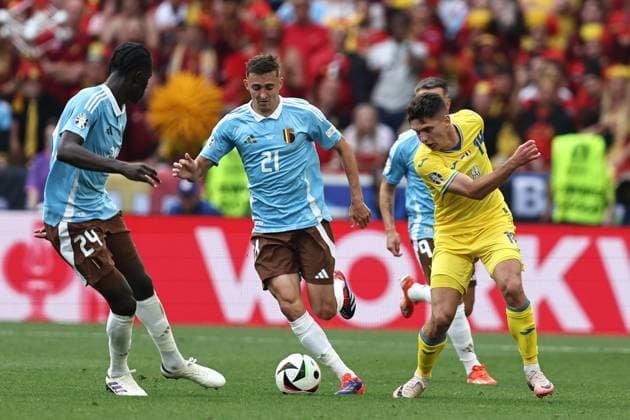 Heorhiy Sudakov (Ukraine)Timothy Castagne (Belgium)Amadou Onana (Belgium) during the UEFA EURO, EM, Europameisterschaft,Fussball Germany 2024 match between Ukraine 0-0 Belgium at Stuttgart Arena on June 26, 2024 in Stuttgart, Germany. Noxthirdxpartyxsales  (257799976)