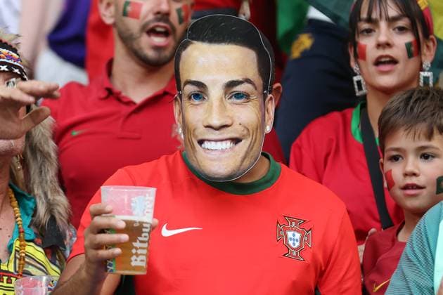 European Championship 2024 Georgia Portugal on 26 06 2024 in the Arena AufSchalke in Gelsenkirchen A Portugal fan with Cristiano Ronaldo 7, Portugal mask drinks a beer MH