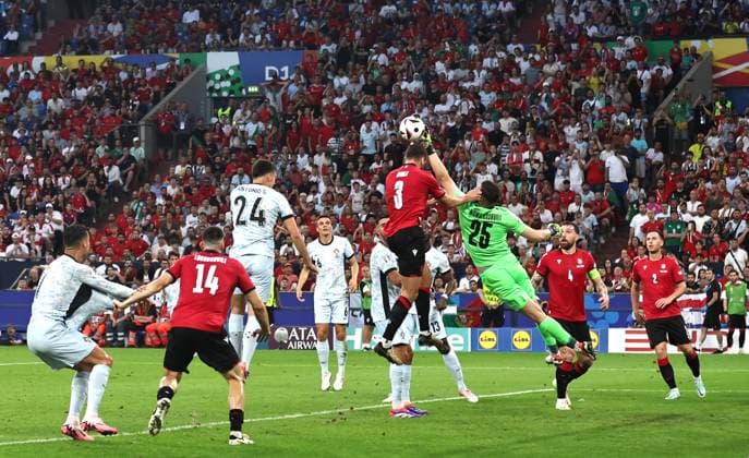 (240627) -- GELSENKIRCHEN, June 27, 2024 -- Giorgi Mamardashvili (3rd R), goal keeper of Georgia, saves the ball during the UEFA EURO, EM, Europameisterschaft,Fussball 2024 Group F match between Portugal and Georgia in Gelsenkirchen, Germany on June 26, 2024. ) (SP)GERMANY-GELSENKIRCHEN-FOOTBALL-EURO 2024-PORTUGAL VS GEORGIA ZhangxFan 