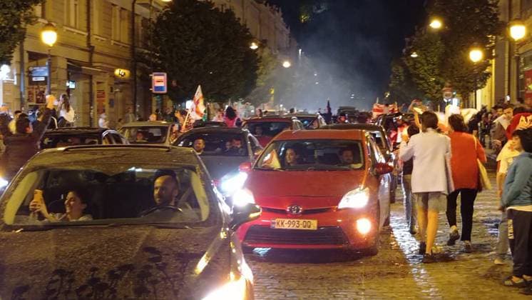 GEORGIA, TBILISI - JUNE 27, 2024: Football fans celebrate Georgiaâ€™s victory over Portugal in their UEFA EURO, EM, Europameisterschaft,Fussball 2024 Group F match. Georgiaâ€™s national team, Nationalteam won 2-0 to secure qualification to the knockout stages of the tournament. Inna Kukudzhanova TASS  0701943461st
