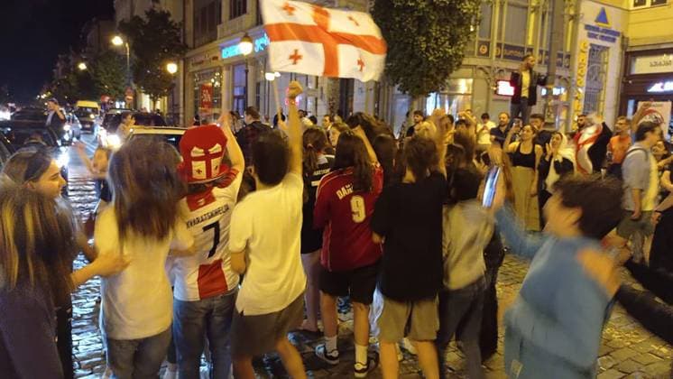 GEORGIA, TBILISI - JUNE 27, 2024: Football fans celebrate Georgiaâ€™s victory over Portugal in their UEFA EURO, EM, Europameisterschaft,Fussball 2024 Group F match. Georgiaâ€™s national team, Nationalteam won 2-0 to secure qualification to the knockout stages of the tournament. Inna Kukudzhanova TASS  0701943467st