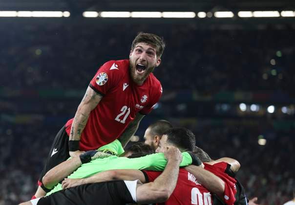 Football - 2024 UEFA European Championship, EM, Europameisterschaft Finals - Group F - Gerogia vs Portugal - Arena AufSchalke, Gelsenkirchen - Wednesday 26th Junes 2024 Giorgi Tsitaishvili of Georgia celebrates at full time as Georgia qualify for the next round of Euro 2024 